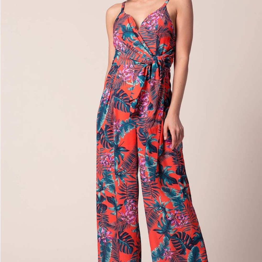 Elegant White Jumpsuit with Red and Blue Accents